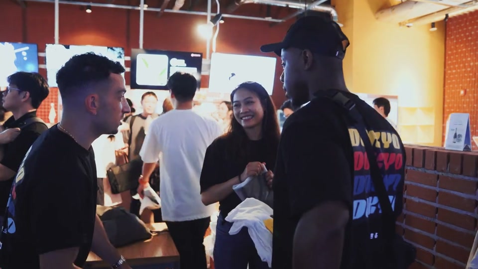 Guests talking at a Dokyo community event in Seoul