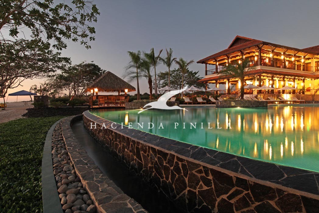 The Hacienda Pinilla Beach Club pool and deck near the Pacific